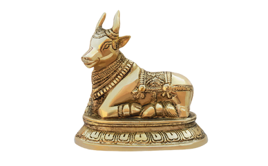 Golden-toned Nandi Ji murti on an ornate pedestal