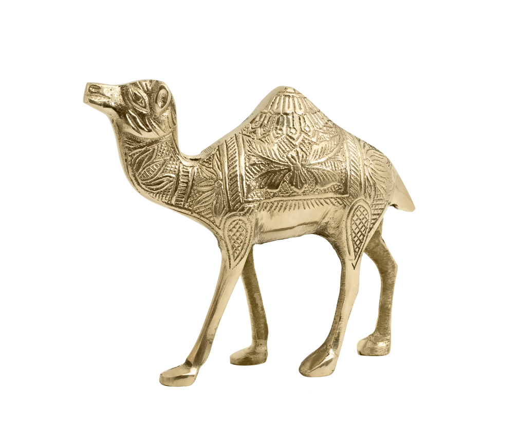Golden camel statue with ornate carved detailing
