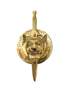 Golden lion face wall hanging with sword motif