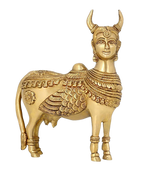 Golden Kamdhenu Cow statue with ornate decorative detailing