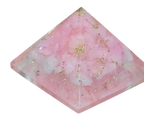 Soft pink Rose Quartz crystal pyramid with translucent facets