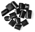 Black Tourmaline tumble stones with smooth rounded shapes and glossy dark surfaces