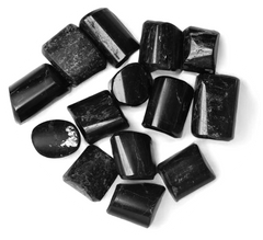 Black Tourmaline tumble stones with smooth rounded shapes and glossy dark surfaces