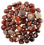 Natural polished Red Jasper tumble stones in red, terracotta, and brown tones