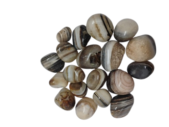 Natural polished Sulemani tumble stones with black, grey, cream, and beige banding
