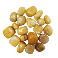 Natural polished Yellow Jade tumble stones in warm yellow and earthy tones