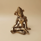 Seated Indra Dev idol shown from a front three-quarter angle