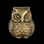 Slight angle view of the antique gold-bronze owl decor piece