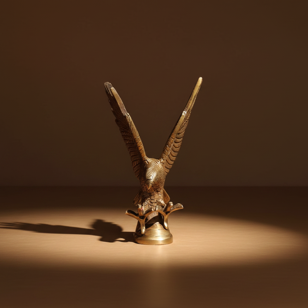 Antique-gold Eagle Idol shown from the front with raised wings