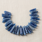 Close-up of rough blue and steel-blue Kyanite Crystal Chips