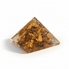 Elevated view of a Tiger Eye crystal pyramid with golden-brown facets
