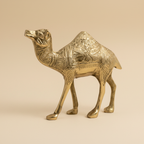 Golden camel statue elevated three-quarter view