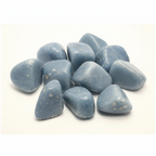 Close-up arrangement of Angelite tumble stones on a light background