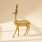 Golden deer statue front three-quarter view