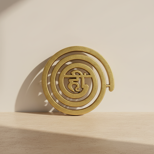 Gold-brass Helix spiral decor displayed on a warm neutral surface