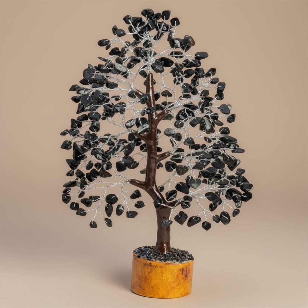 Close three-quarter view of a Black Tourmaline crystal tree with dark chips and branching trunk