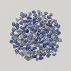 Close-up of natural Lapis Lazuli Chips with blue and grey variation