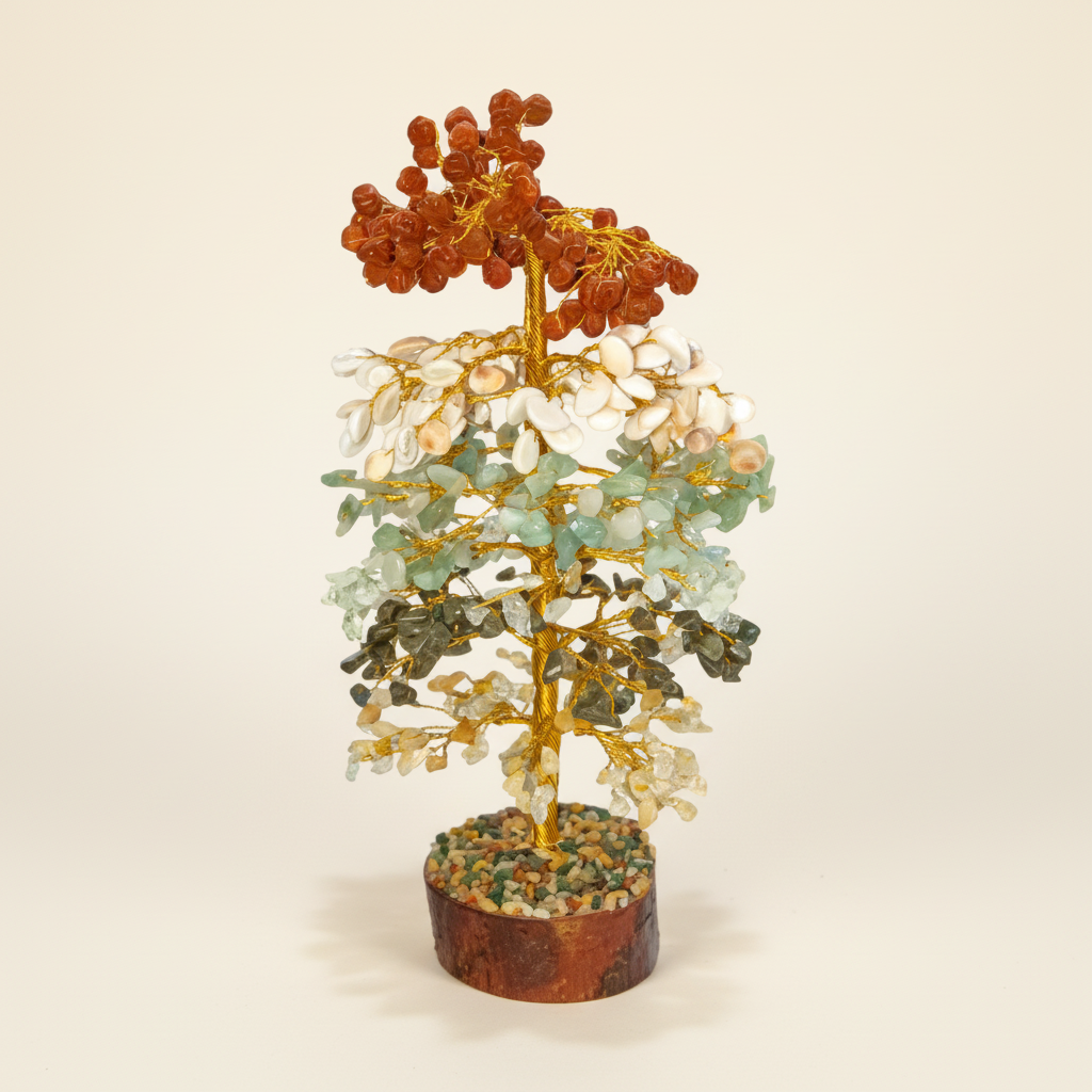 Multi-Color crystal tree with layered orange, cream, pale green, and deep green stones on an ivory background