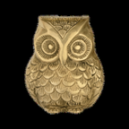 Closer view of the antique gold-bronze owl decor piece