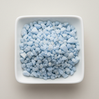Angelite crystal chips arranged in a white ceramic dish