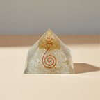 Pale white Selenite crystal pyramid on a soft premium studio background