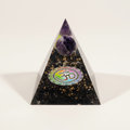 Front view of a black tourmaline crystal pyramid with purple crystal and Om symbol