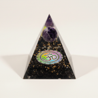 Front view of a black tourmaline crystal pyramid with purple crystal and Om symbol