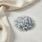 Fluorite crystal chips arranged with neutral linen décor