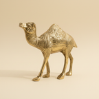 Golden camel statue front three-quarter view