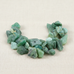 Close-up of irregular translucent mint-green and pale aqua Green Jade Crystal Chips