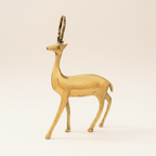 Golden deer statue elevated front view